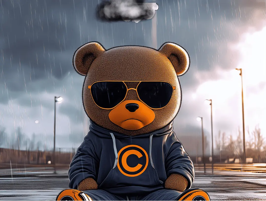 Bear mourning the loss, sitting in parking lot
